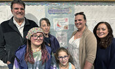 Back row from left: Sioux Lookout Skating Club 50/50 Raffle winner Dan Rioux and his wife Shannon, Sioux Lookout Skating Club Fundraising Chair Melissa Slade and Andrea Cospito. Front row from left: Sisters Rilynne Cospito and Tessa Cospito who sold the w