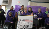 Skip to Equip Classic Committee member Marlene MacDonald, this year’s top individual pledge getter, thanks everyone who contributed to the fundraising event as the rest of the Committee looks on.     Tim Brody / Bulletin Photo