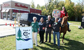 Promoting smile cookie sales in 2019. From left: Municipal Councillor and Friends of Cedar Bay (FCB) member Joyce Timpson, FCB member Lyndsay Gould, Sioux Lookout Mayor Doug Lawrance, FCB member Michael O’Brien, and FCB member Destiny Pryzner atop Cedar B