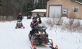 Snowmobilers head out on the trails during last year’s Snowarama event.    Bulletin File Photo