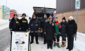 Sioux Lookout OPP and First Step Women’s Shelter representatives conduct las year’s Stuff A Cruiser initiative. - Bulletin File Photo