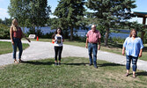 From left: Sioux Lookout Photography Group founding member Sarah Fraser, first place winner Shantal Agustin, Stuart Cummings, also a founding member of the Sioux Lookout Photography Group and Sioux Lookout Chamber of Commerce President Katie Positano. - T