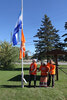 From left: Sioux Lookout Mayor Doug Lawrance, Municipal Truth and Reconciliation Committee Chair Darlene Angeconeb, and Lac Seul First Nation Chief Clifford Bull raise the Survivors Flag.    Tim Brody / Bulletin Photo