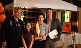 Shane Sakchekapo was named the recipient of the Committee’s Choice Award, but was unable to attend the event due to a prior commitment. Accepting the award on Sakchekapo’s behalf from Matthew Angeconeb are his father George Sakchekapo and his children Kin