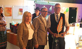Tracy Bullock and Todd Naden present the Education Award to Andy Schardt.     Tim Brody / Bulletin Photo