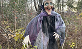 Ghastly sights met those brave enough to traverse the haunted trail during Boo at the Bay. Haunters posed for a group photo at the event’s conclusion.     Tim Brody / Bulletin Photo