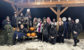 Ghastly sights met those brave enough to traverse the haunted trail during Boo at the Bay. Haunters posed for a group photo at the event’s conclusion.     Tim Brody / Bulletin Photo