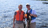 Evan Hochstedler (left) and Collin Hochstedler with their day one catches, which totaled 7.03 pounds. - Jesse Bonello / Bulletin Photo