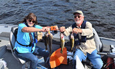 Robert Mansfield (right) and Karen Mansfield placed 28th at this year’s tournament, with a total two day weight of 15.60 pounds. - Jesse Bonello / Bulletin Photo