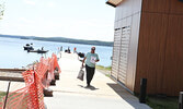 Kirk Mousseau brings his catch in to be weighed.   Tim Brody / Bulletin Photo