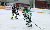 The Warriors battle the Muskies in boys hockey action on Feb. 8.   Tim Brody / Bulletin Photo