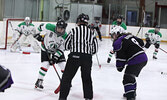  Warriors Girls Hockey Team Captain Haylee Bouchard (#19) prepares for a faceoff. Bouchard led her team in scoring during their last home game of the season with a hat trick.  Tim Brody / Bulletin Photo