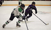 Kiera Schulz (14) skating the puck up the ice, clearing the defensive zone. - Jesse Bonello / Bulletin Photo