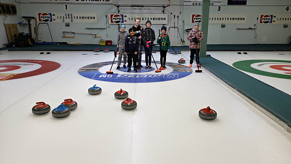 Young learners embracing youth curling program